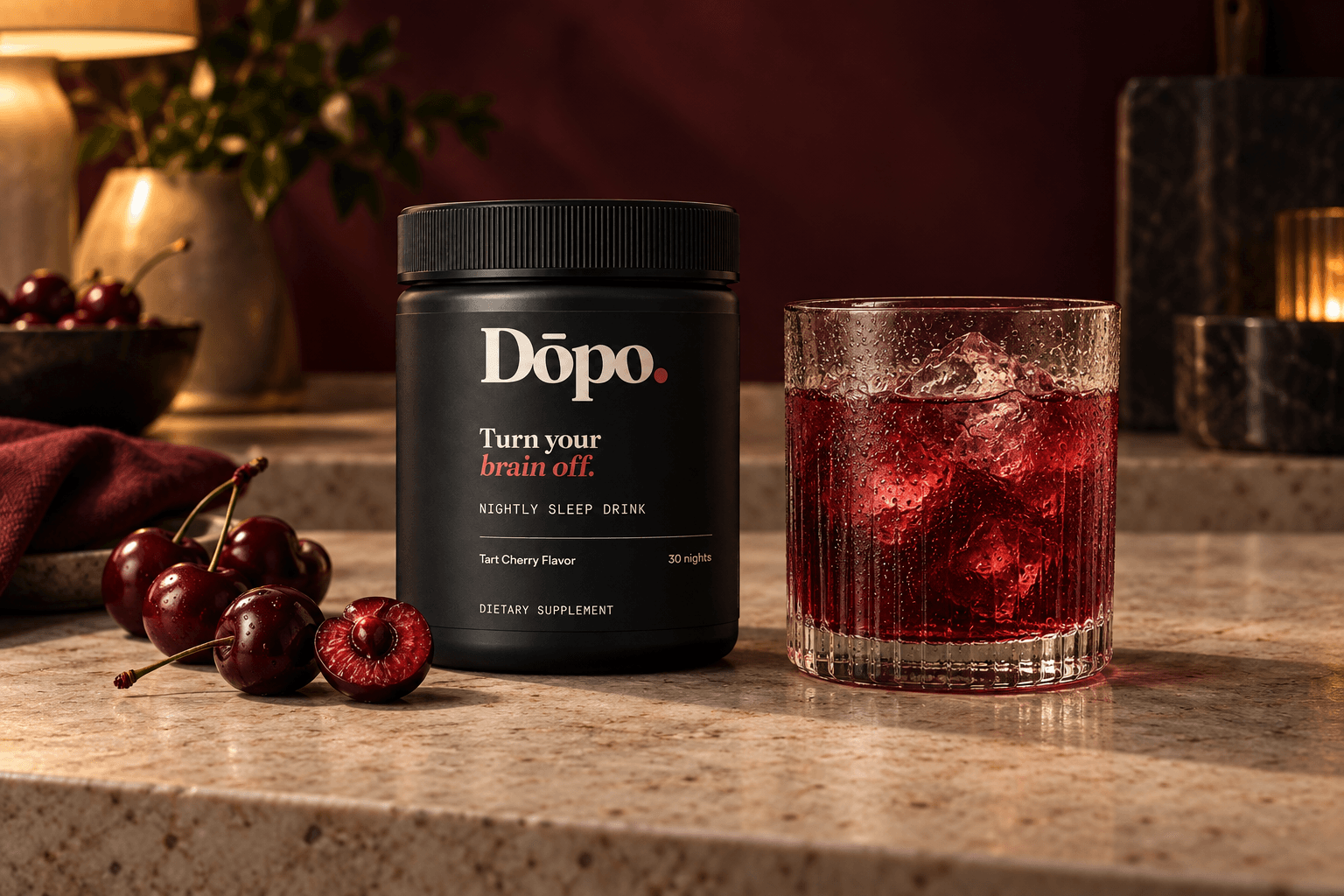 Dōpo Tart Cherry nightly sleep drink tub and ruby drink on a warm evening table
